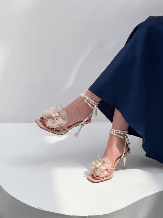 Pearl Bloom heels for women with pearl ankle straps, sheer floral embellishment, open toe and slim transparent-style heel