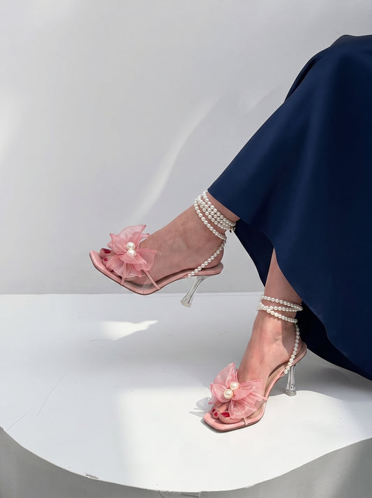 Pearl Bloom heels for women with pearl ankle straps, sheer floral embellishment, open toe and slim transparent-style heel