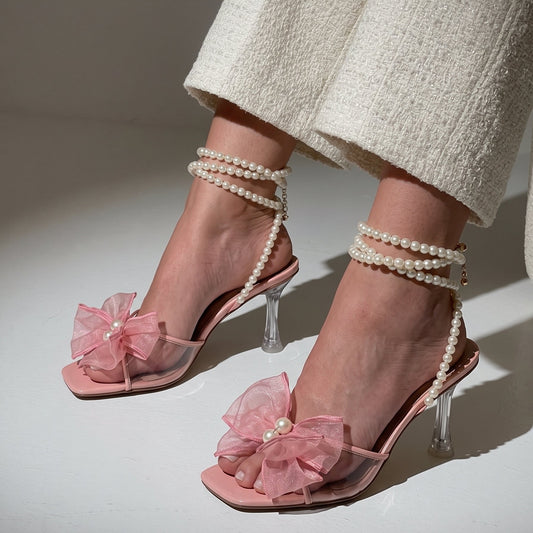 Pearl Bloom heels for women with pearl ankle straps, sheer floral embellishment, open toe and slim transparent-style heel