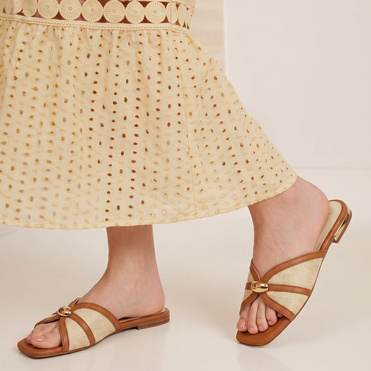 Muse Buckle square toe flats for women with crossover straps, textured upper and metallic buckle detail